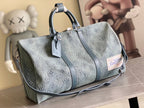 Louis Vuitton men’s bag, blue monogram canvas with leather trim and top handles