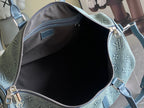 Louis Vuitton men’s bag open top, dark interior lining and blue monogram canvas