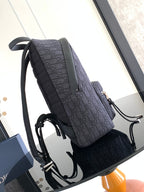 Dior men's monogram backpack with adjustable straps and side snap pocket