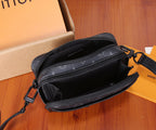Louis Vuitton monogram crossbody bag with top zipper open, black interior and trim close-up