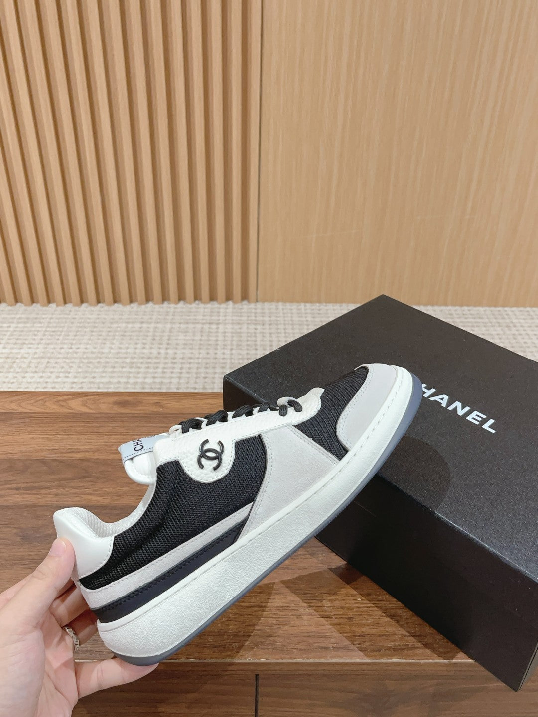Unisex low-top sneakers and Chanel box, black and white, lace-up