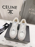White lace-up sneakers with fuzzy shearling lining and chunky platform sole