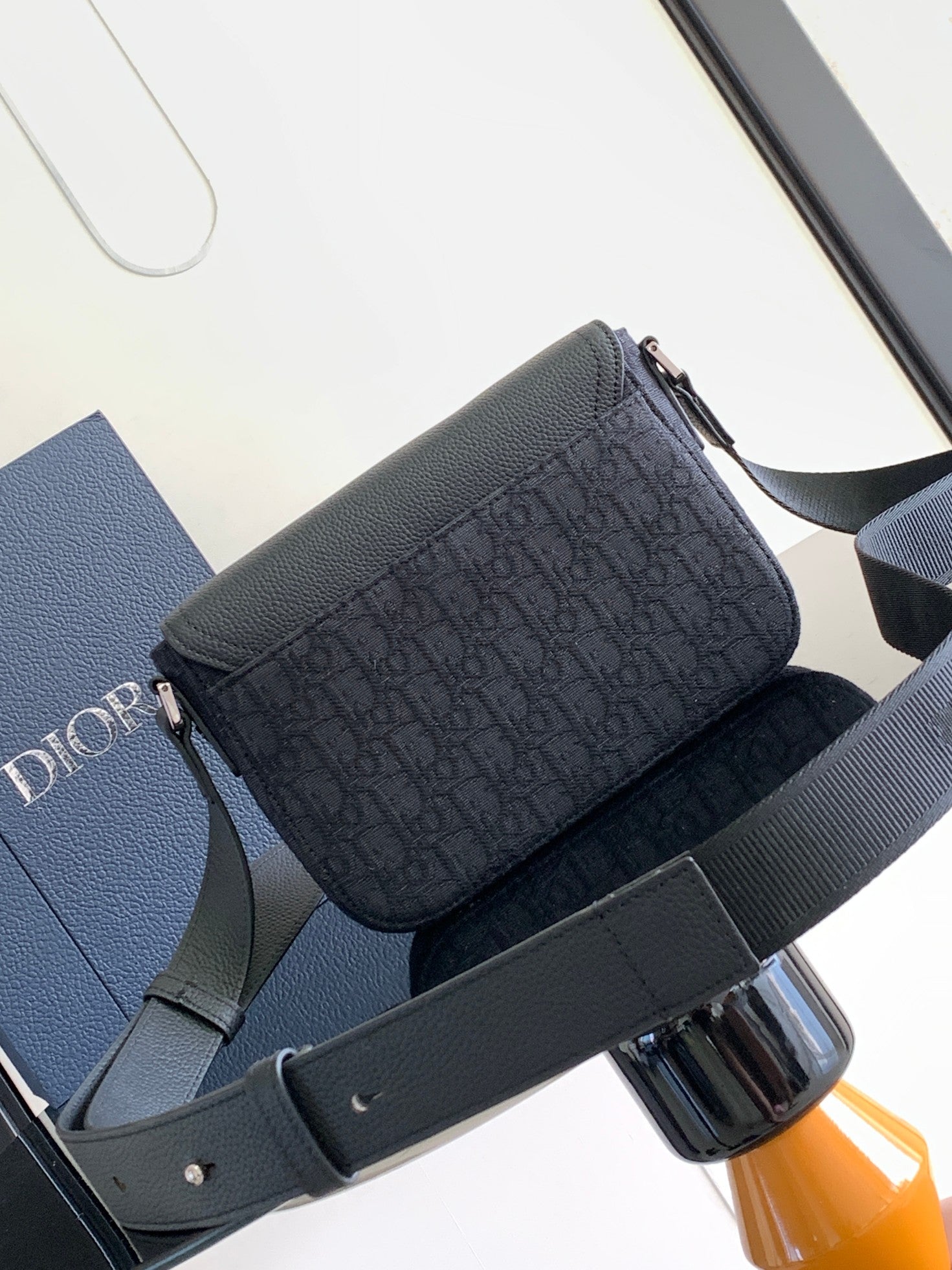 Dior crossbody bag with front logo pattern and top zip, dark gray view