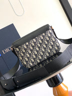 Dior bag with gray shoulder strap and Dior monogram canvas front, side view
