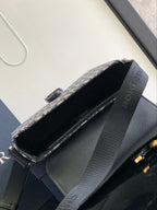 Dior bag open top with black interior and Dior monogram canvas, side view