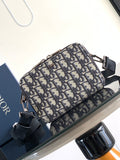Dior bag crossbody in navy and beige Dior pattern canvas with black strap and hardware
