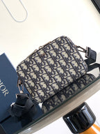 Dior bag crossbody in navy and beige Dior pattern canvas with black strap and hardware