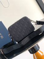 Dior bag dark navy monogram canvas with crossbody strap and silver hardware