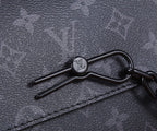 Louis Vuitton carabiner connector with LV emblem on black strap hardware