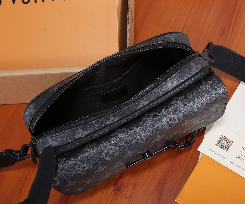 Men's Louis Vuitton crossbody bag interior view with zipper track and dark lining