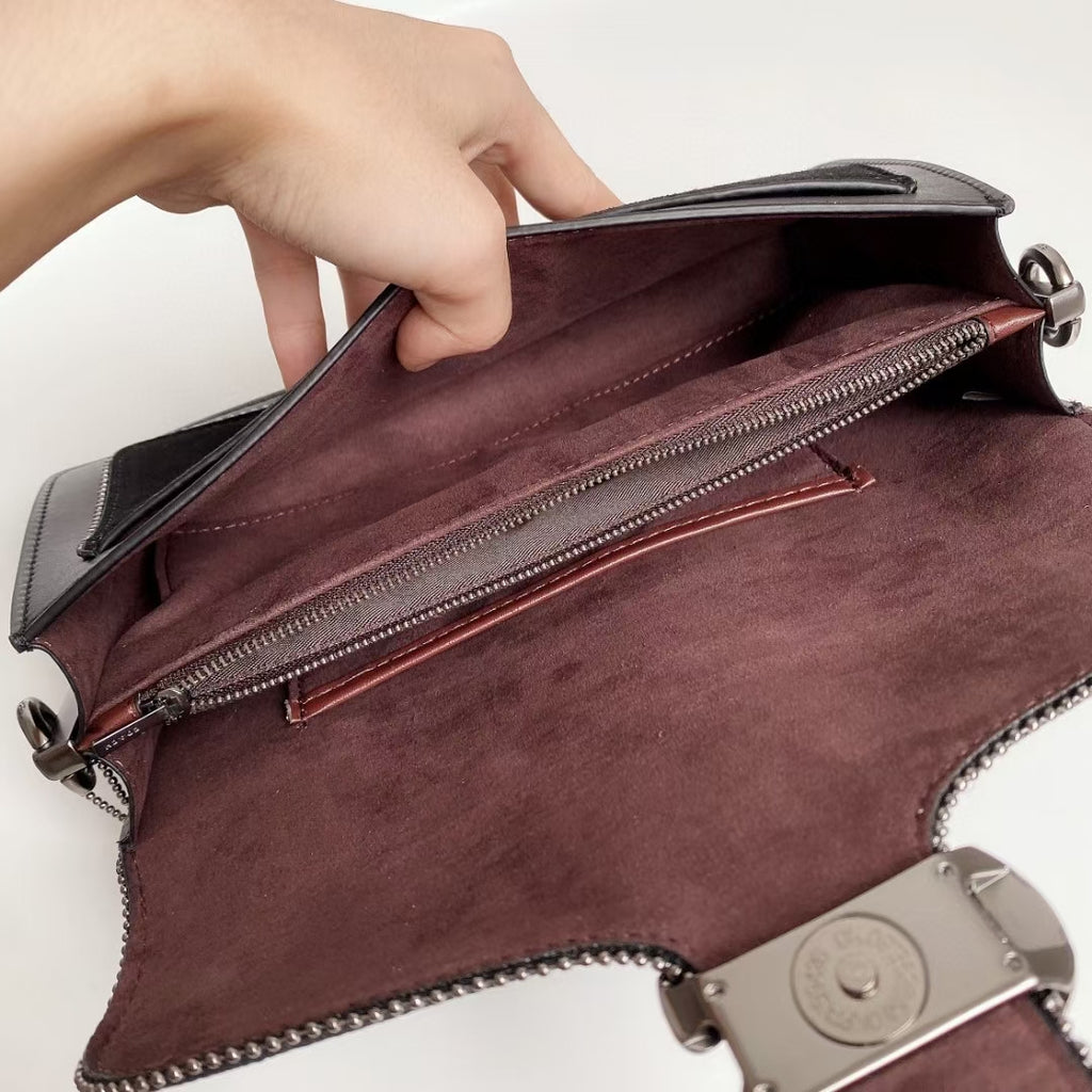 Coah bag open top with long zip pocket and maroon lining, burgundy exterior