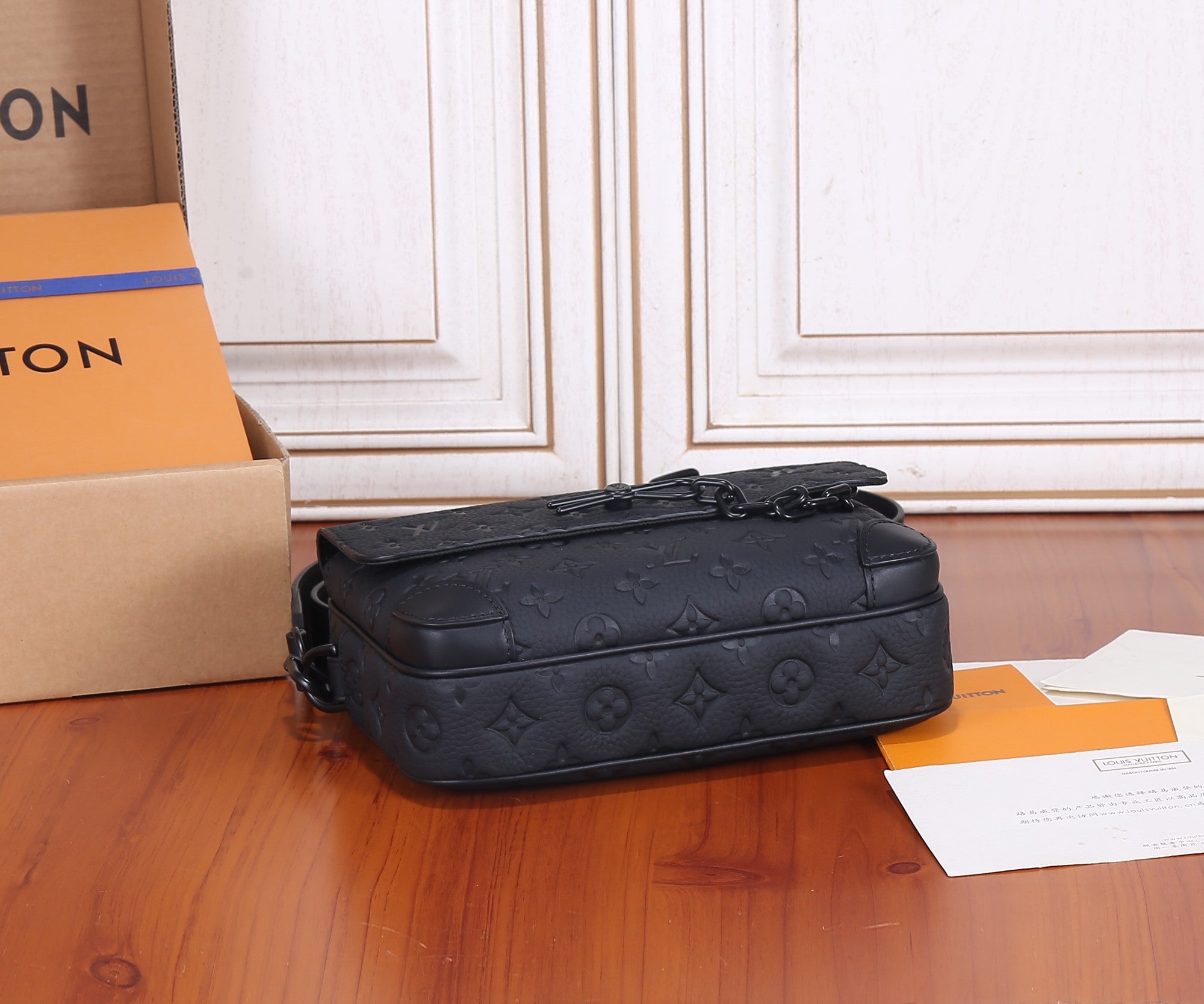 Louis Vuitton belt bag, dark navy monogram leather, top zip and chain shoulder strap