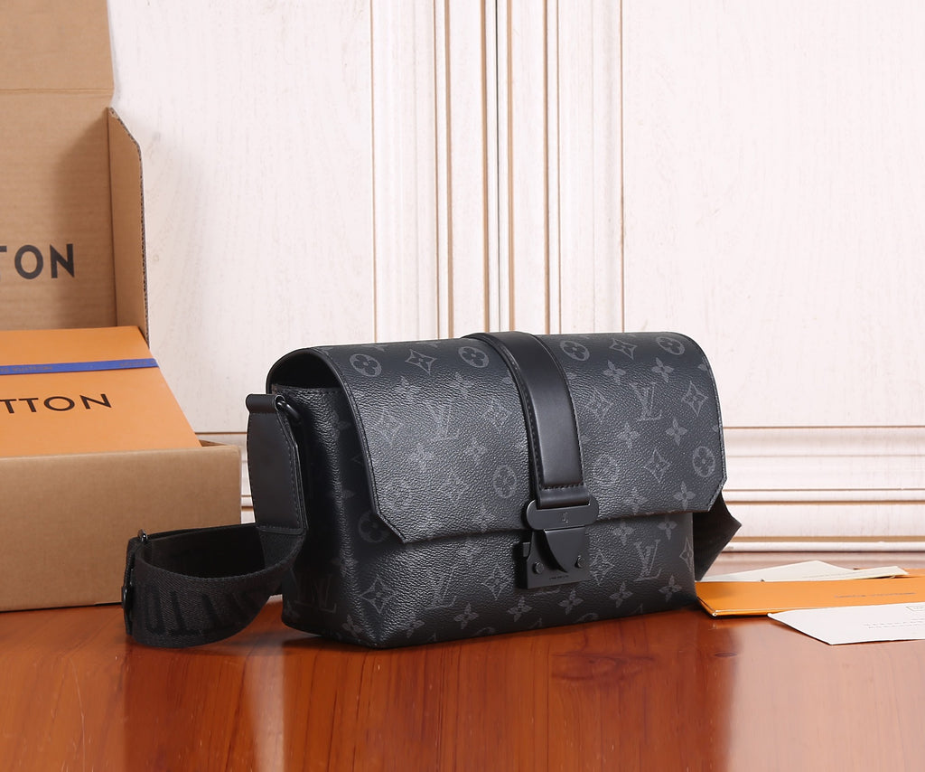 Louis Vuitton monogram shoulder bag with curved flap and black crossbody strap