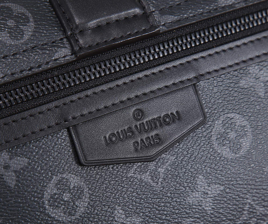 Louis Vuitton monogram bag embossed leather label near zipper