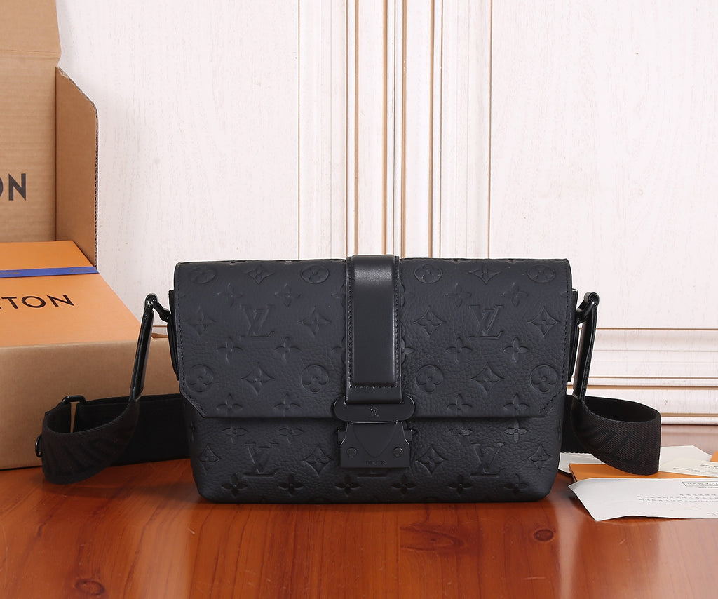 Black Louis Vuitton monogram crossbody bag with flap and adjustable strap