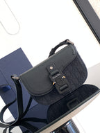 Dior flap shoulder bag, dark navy textured leather, adjustable strap, metal clasp