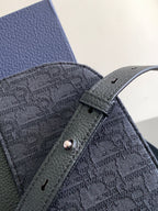 Dior bag front panel, dark textured fabric with snap tab and stitched trim