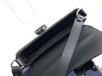 Dior leather crossbody bag, dark interior and adjustable strap with metal buckle
