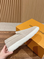 Louis Vuitton suede slip-on shoes, light beige, close-up on white sole