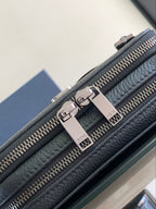 Dark blue textured leather crossbody bag with double zip and silver-tone Dior logo pull