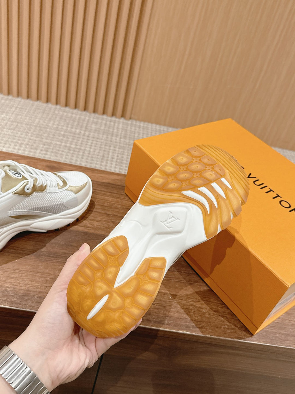 White Louis Vuitton unisex sneaker outsole, treaded rubber sole view