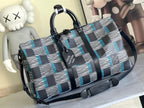 Louis Vuitton duffel bag in navy, blue and white check with top handles and strap