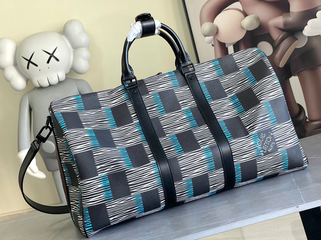 Louis Vuitton duffel bag with navy-blue and white check panels, front zipper and shoulder strap