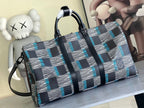Louis Vuitton duffel bag with navy-blue and white check panels, front zipper and shoulder strap