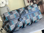 Louis Vuitton duffel bag with flap front, navy and blue check pattern, adjustable shoulder strap
