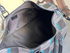Louis Vuitton duffel bag interior view with open top and navy, blue and white check trim