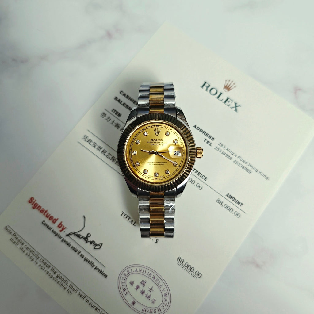 Rolex Day-Date watch with gold dial and two-tone bracelet on certificate card