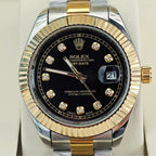 Rolex Day-Date wristwatch with black dial, gold bezel, and diamond-set hour markers