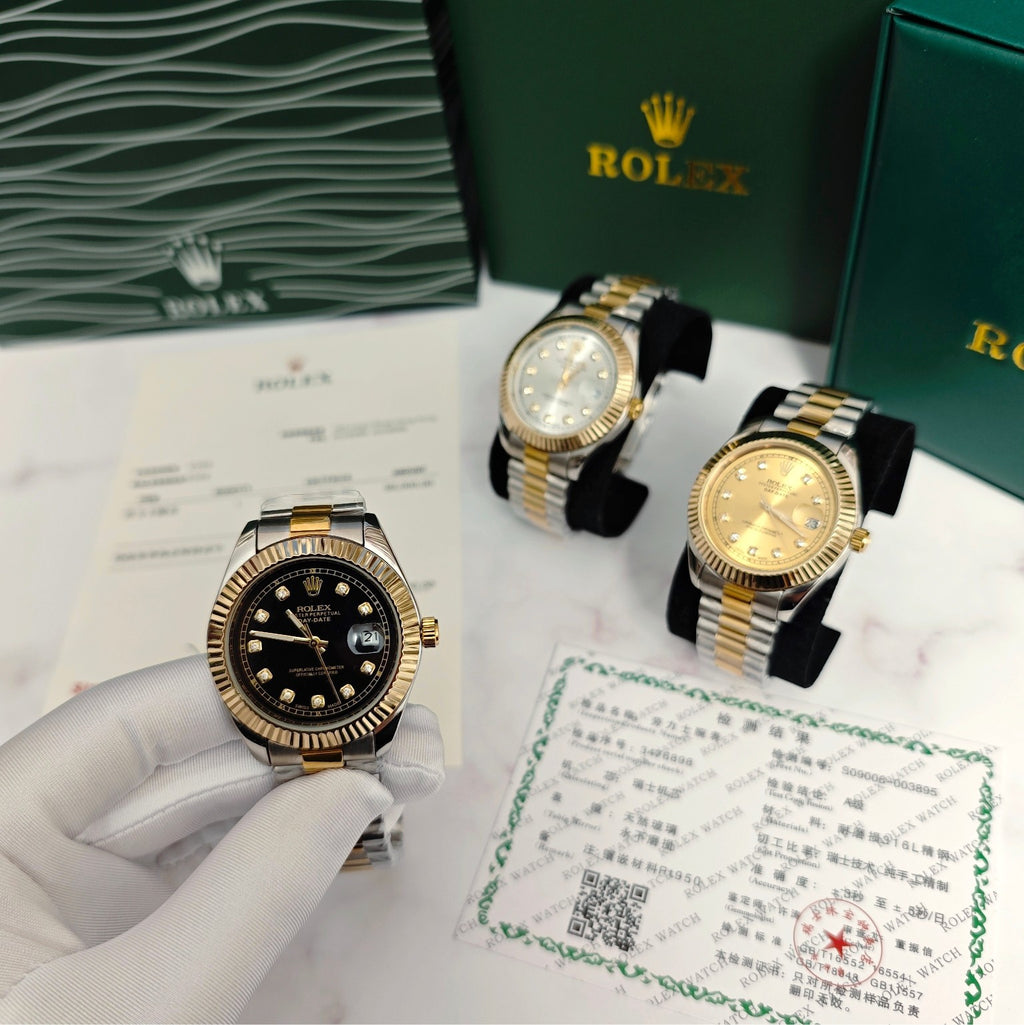 Rolex two-tone wristwatches on display with black dial and gold accents