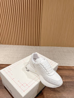 Alexander McQueen white sneakers, lace-up with smooth leather panels and logo tab