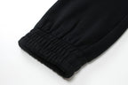 Black ribbed cuff hem on jogger pants
