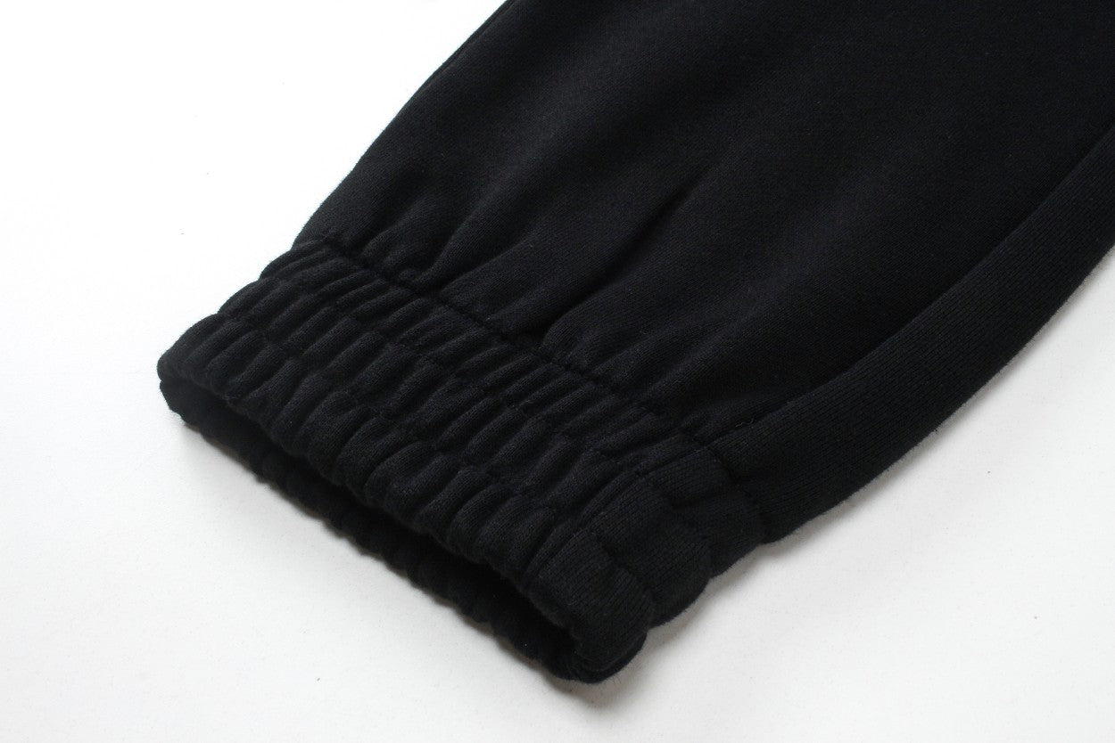 Black ribbed cuff hem on jogger pants