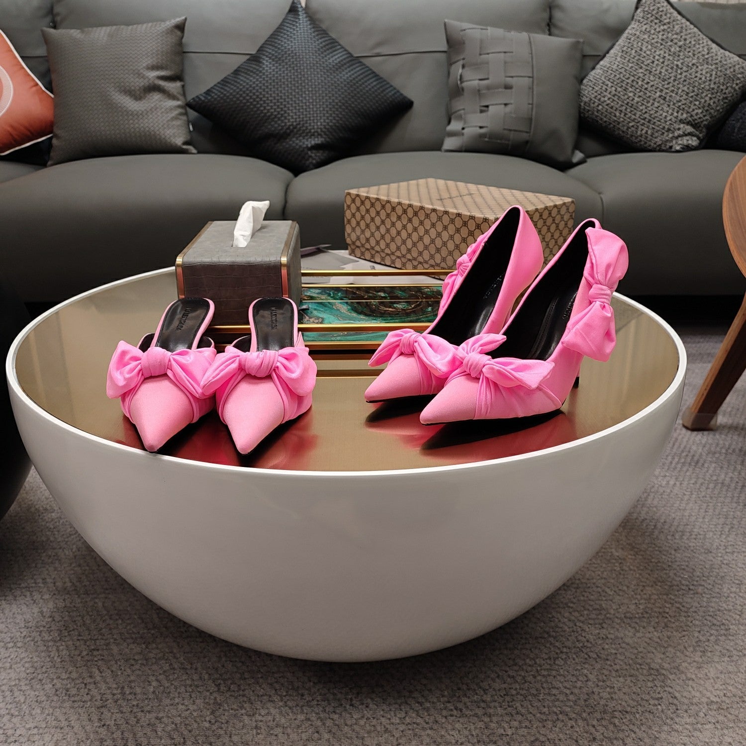 Pink Balenciaga sandals with knotted bow straps and pointed toe, high heel