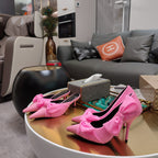 Pink Balenciaga sandals with knotted bow straps and pointed toe, high heel