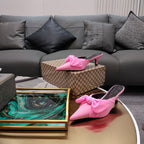 Pink Balenciaga sandals with knotted bow straps and pointed toe, stiletto heel