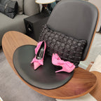 Pink Balenciaga bow sandals with pointed toe and stiletto heel, side view
