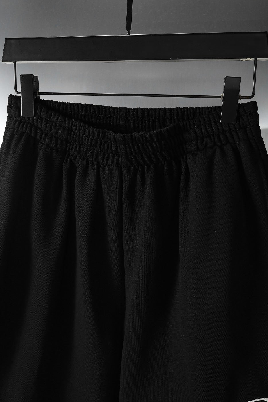 Balenciaga pants in black with elastic waistband and draped leg panels