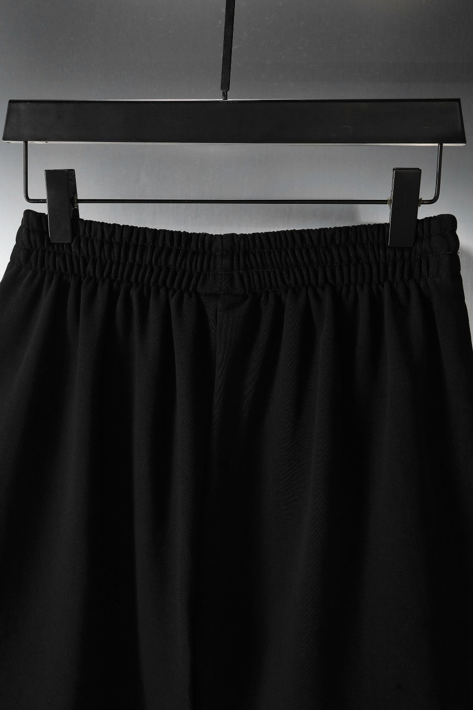 Balenciaga pants in black with elastic waistband and pleated front