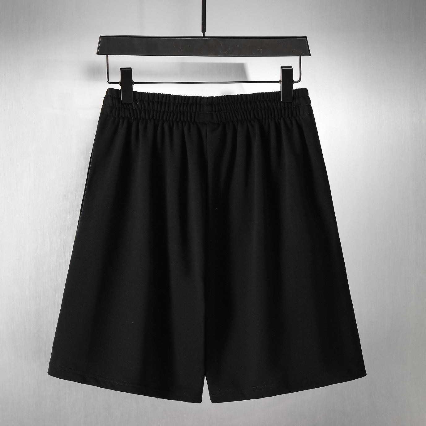 Balenciaga pants in black with elastic waistband and wide leg silhouette
