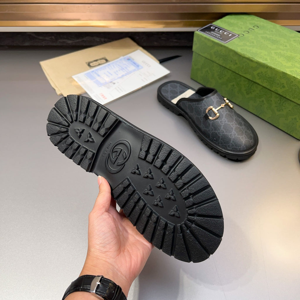 Gucci mule sandal sole view with tread and GG-pattern upper, gold-tone horsebit detail