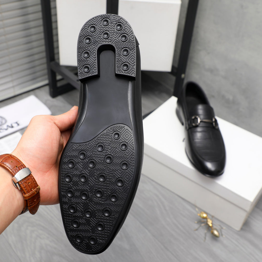 Leather loafer outsole with textured tread and low heel