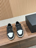 Amiri low-top sneakers, black glitter, white panels, black laces, rubber sole