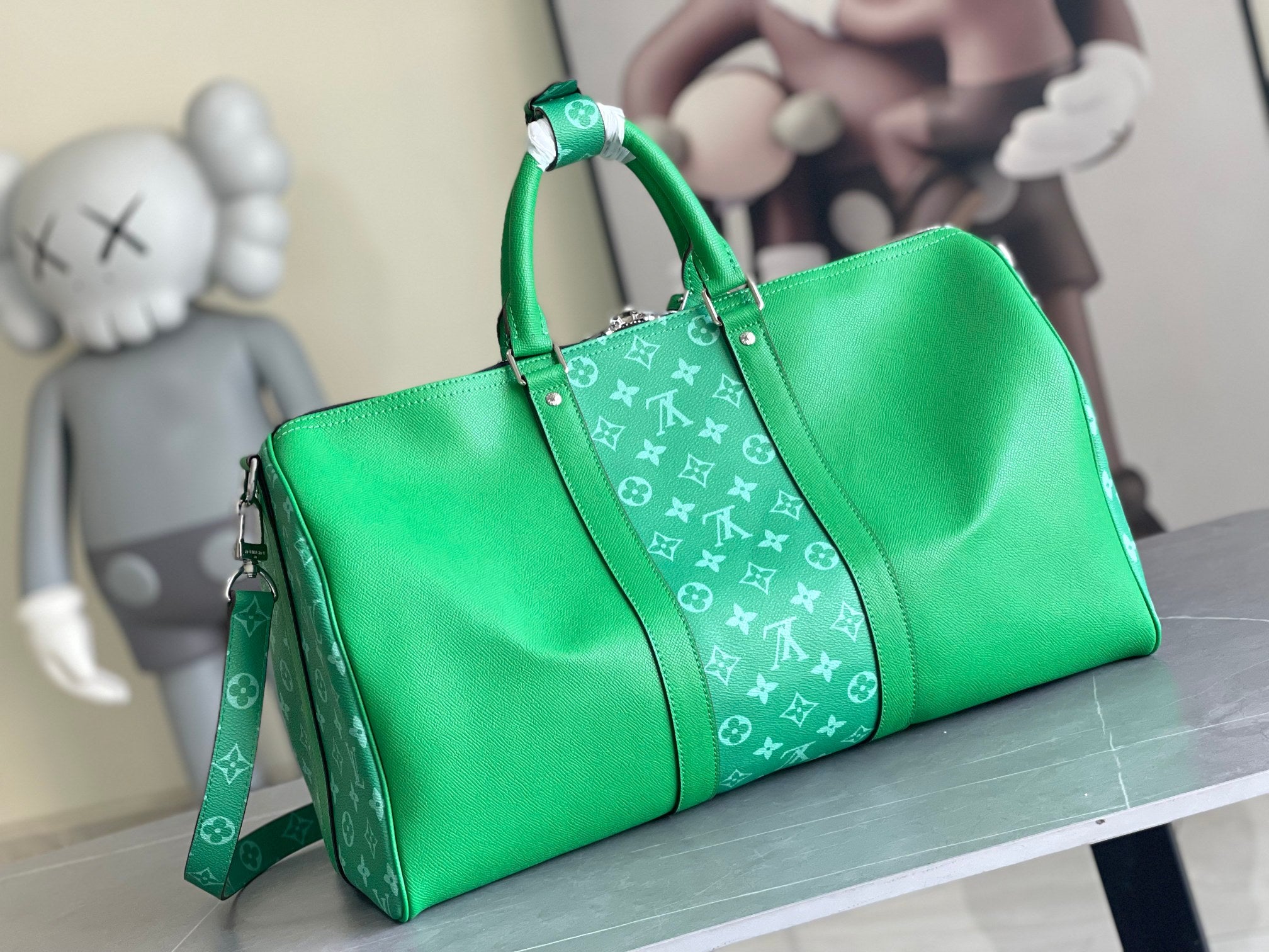 Louis Vuitton men’s green duffel bag with monogram panel, zip top, shoulder strap