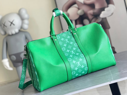 Louis Vuitton men’s green duffel bag with monogram panel, zip top, shoulder strap