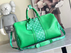 Louis Vuitton men’s green duffel bag with monogram pattern, top handles, shoulder strap