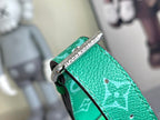 Louis Vuitton men’s green duffel bag close-up of metal keyring tab on leather strap
